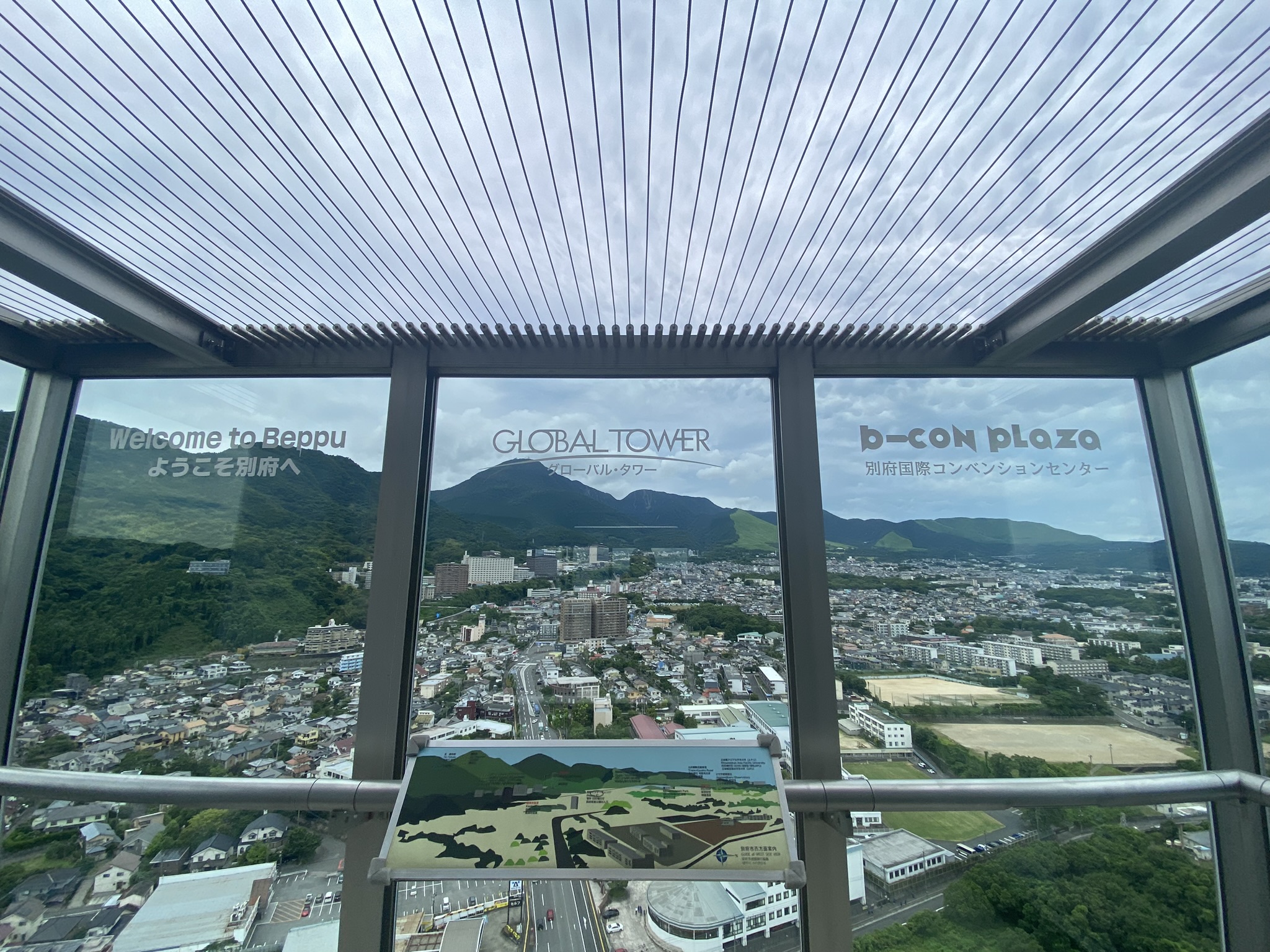 Interior of Global Tower observation deck showing panoramic view of Beppu city