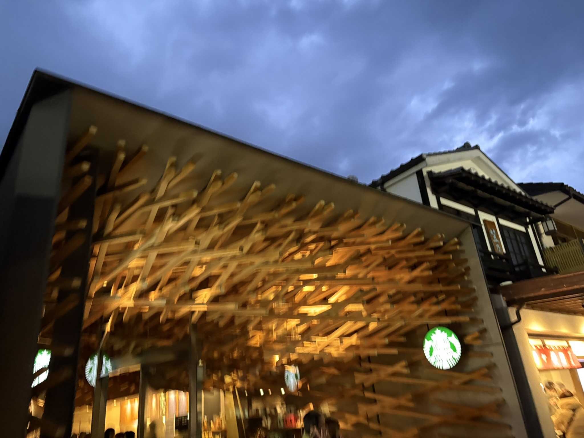 Dazaifu Tenmangu Starbucks wooden lattice facade night illuminated unique architecture