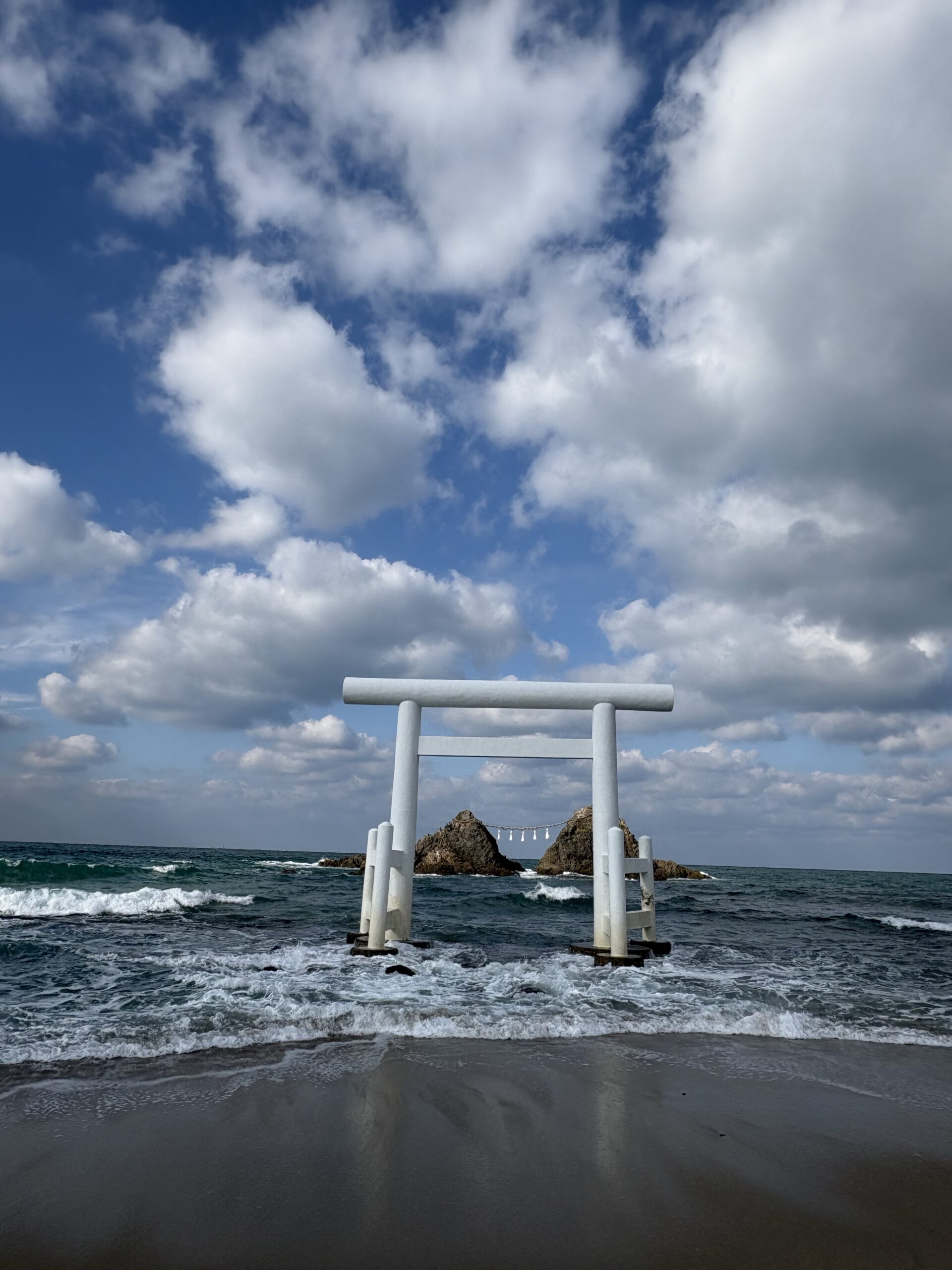 Itoshima Futago Iwa twin rocks close up sacred shinto rope shimenawa blue ocean Fukuoka