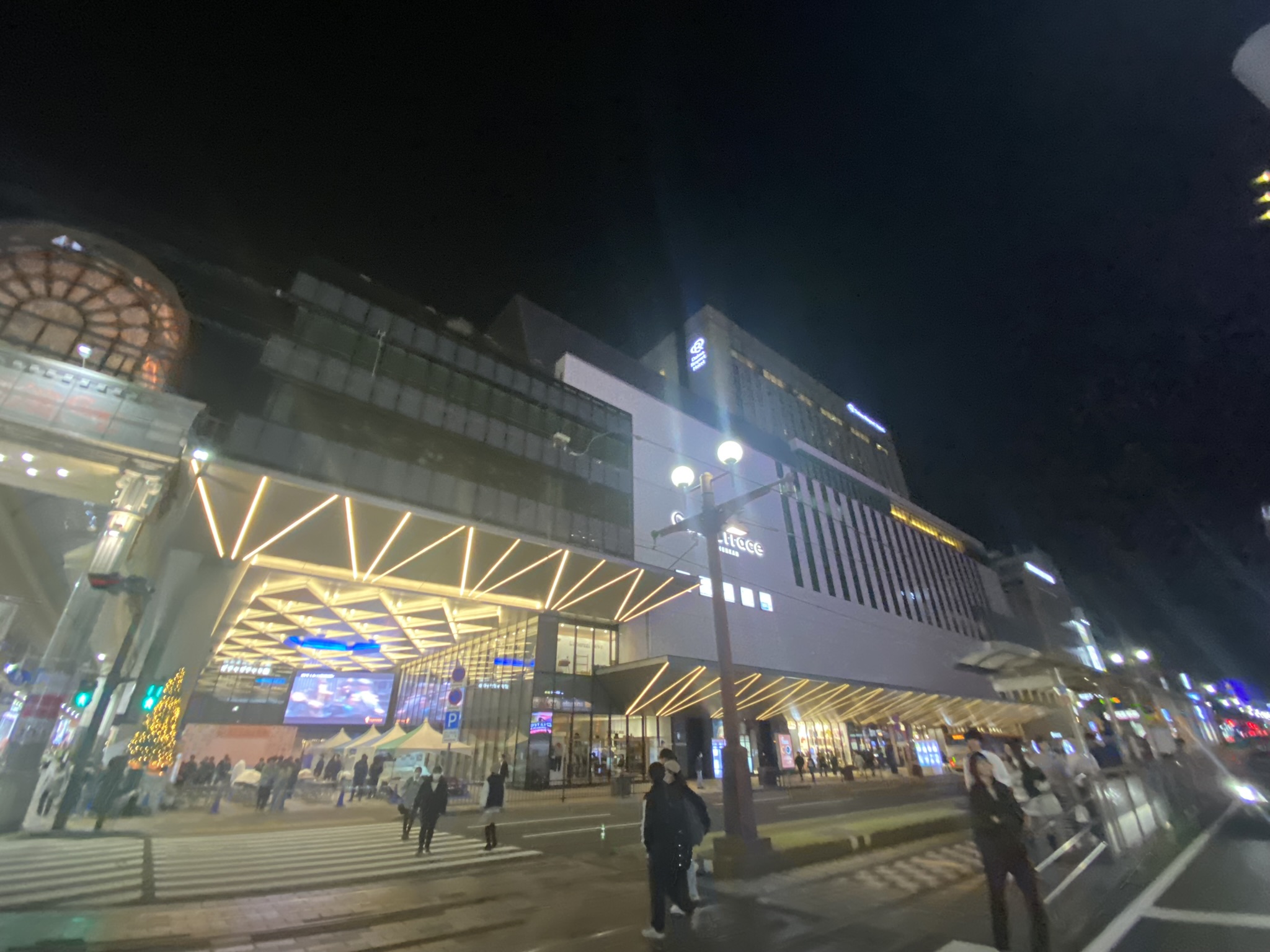 Kagoshima Chuo Station night illuminated Amyu Plaza modern building exterior
