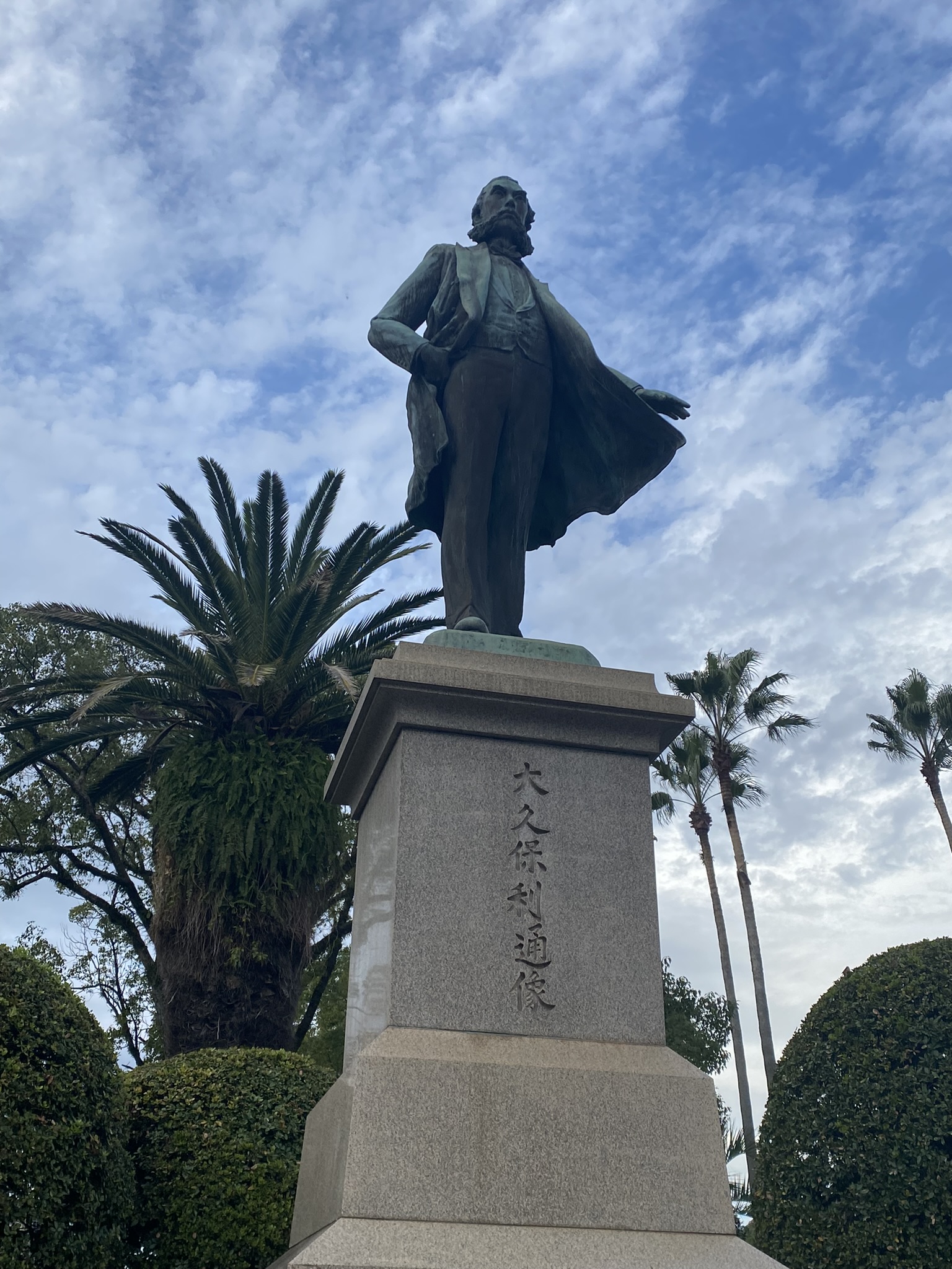 Bronze statue of Okubo Toshimichi Meiji statesman standing in park Kagoshima