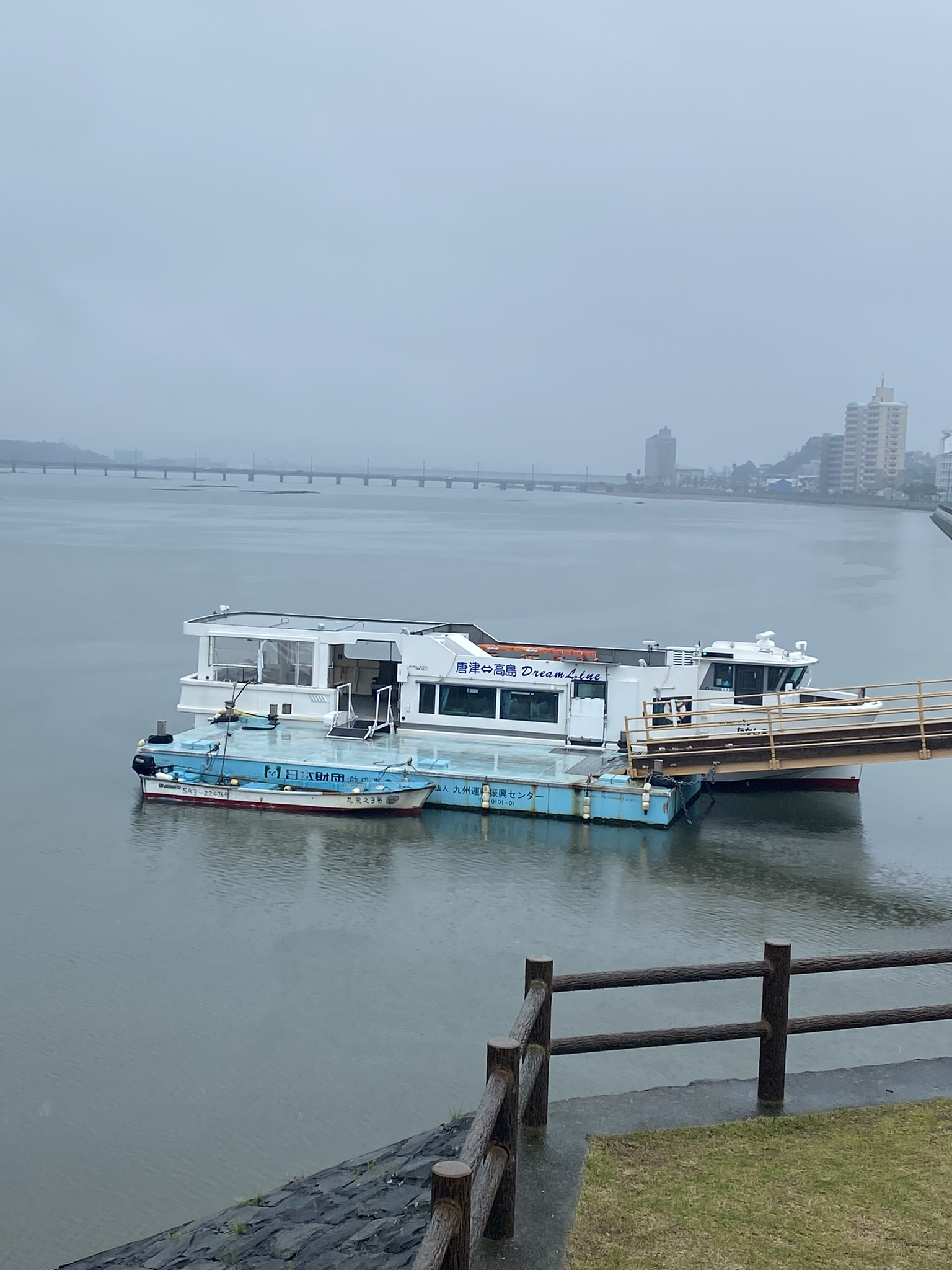 Karatsu Takarashima Dream Line ferry boat rainy day harbor pier Karatsu city background