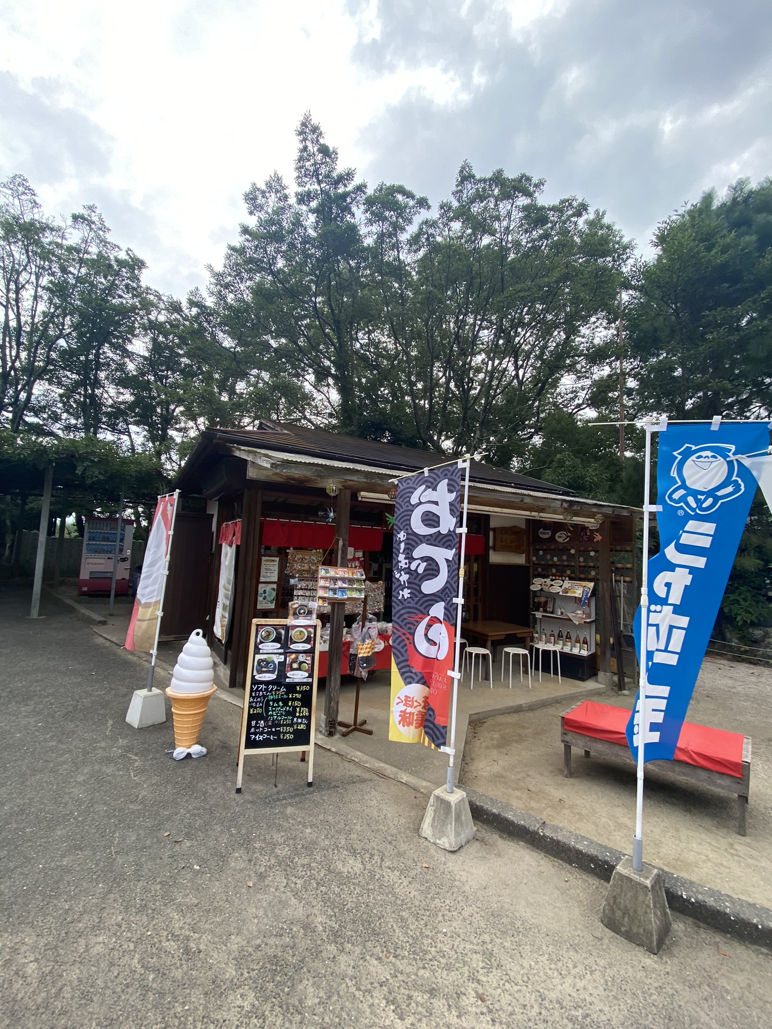 Miyajidake Jinja precincts food stall with softcream sign and blue banner