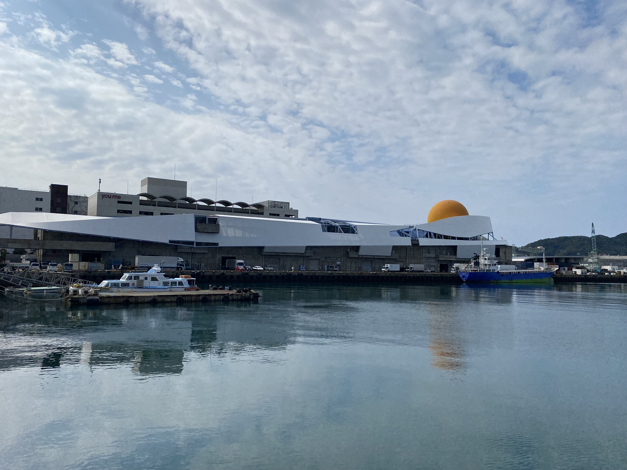 Nagasaki port waterfront with dome-shaped building and white structures