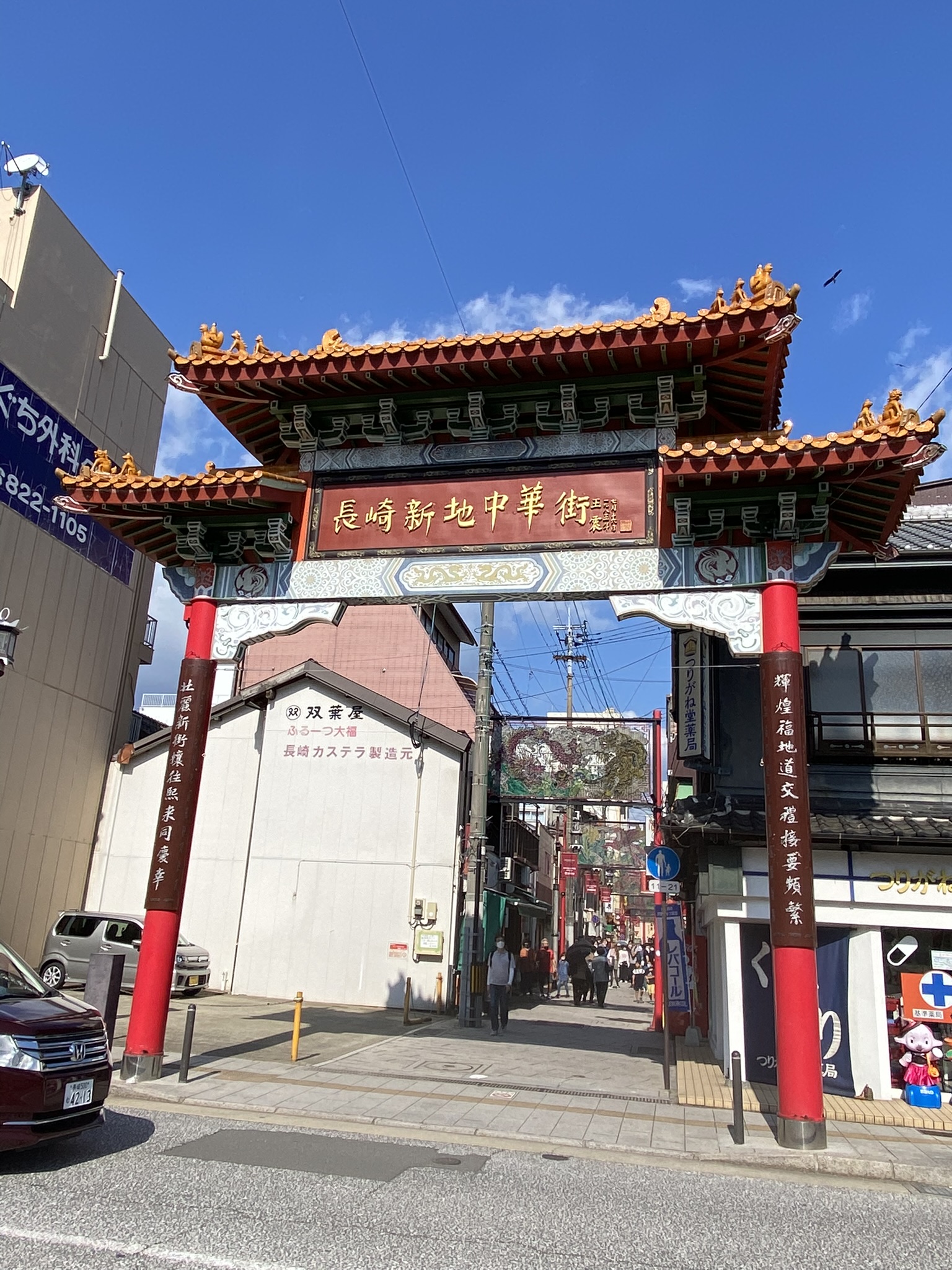 Nagasaki Shinchi Chinatown main entrance gate sign red lanterns shops