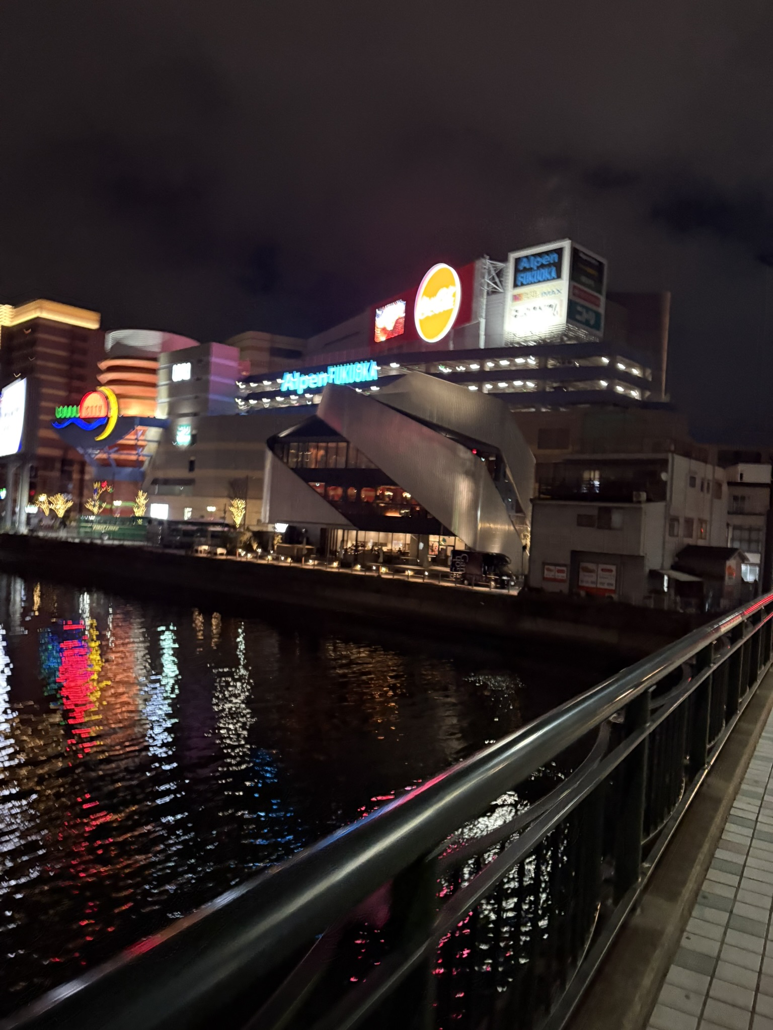 Nakasu entertainment district night neon signs street bar izakaya Hakata Fukuoka