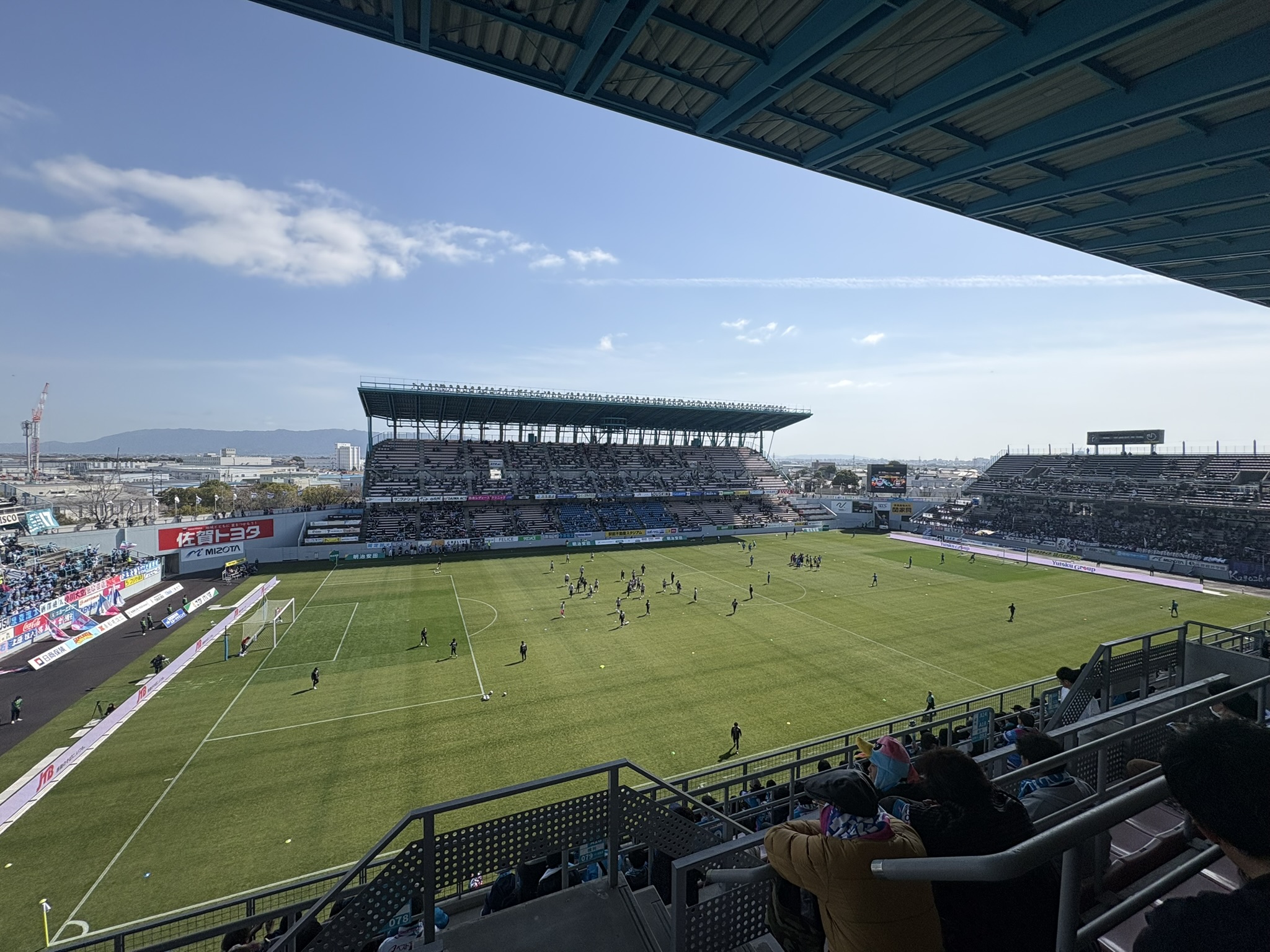 Tosu Ekimae Fudosan Stadium seating stands close proximity compact pitch J League